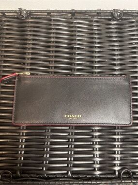 Coach Black Leather Zip Wallet with Red Trim and Gold Logo